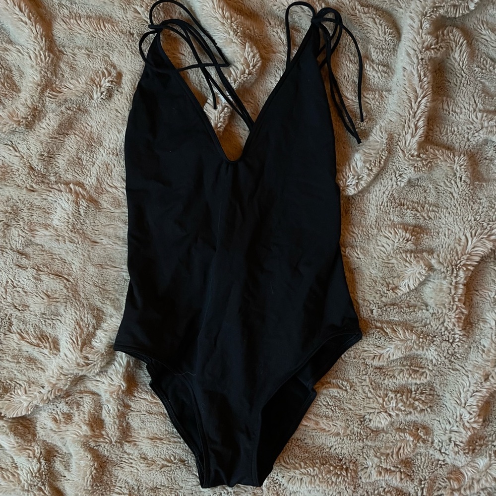 Stretchy one piece with detailed back